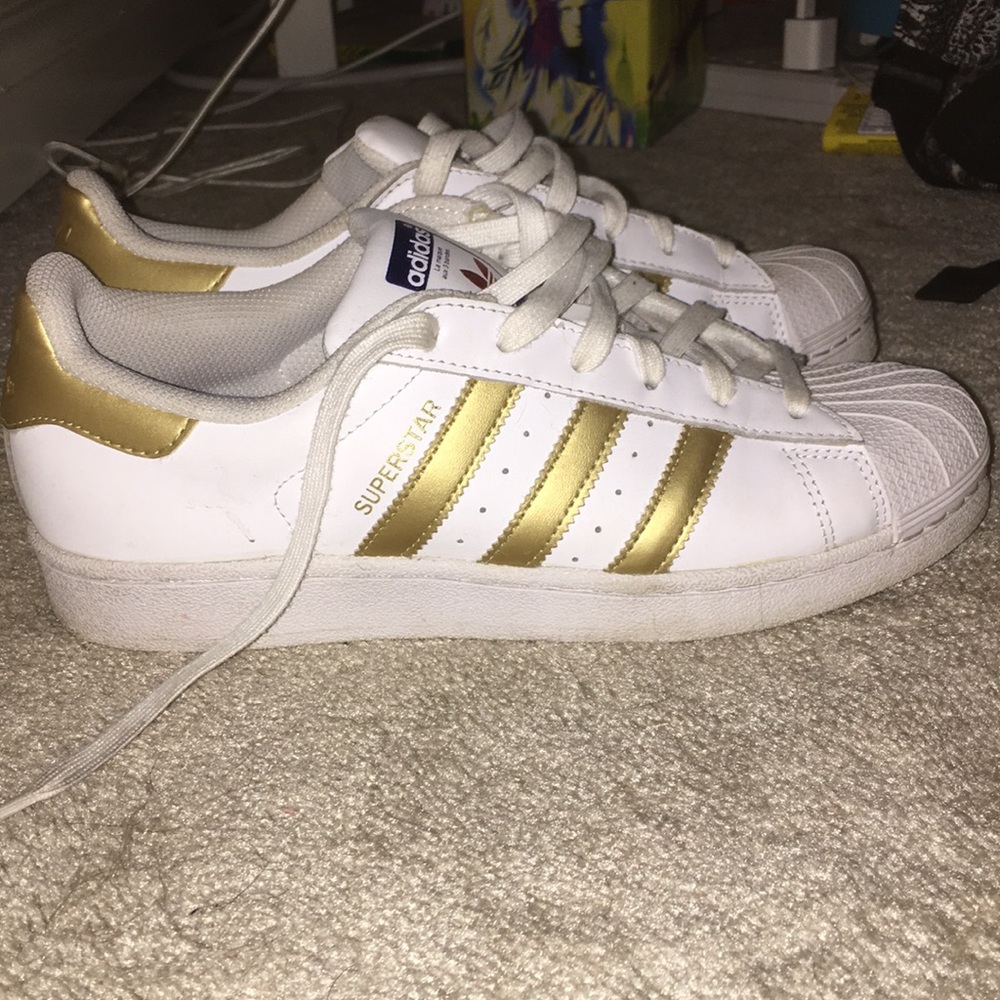 Women’s size 7.5 adidas super star shoes